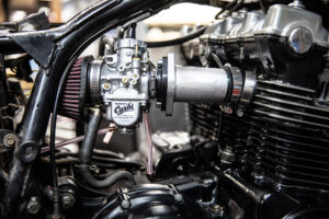 Murray's Honda CB750 performance carburetor kit with the crankcase breather POD MOD installed on the right side. 