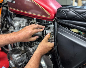 Working on a motorcycle with Murray's Honda CB650 dual Mikuni performance carburetor kit. 