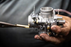 Reinstalling the needle jet in a Mikuni VM series carburetor. 