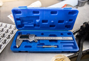 Vernier caliper for measuring Mikuni VM idle protrusion. 