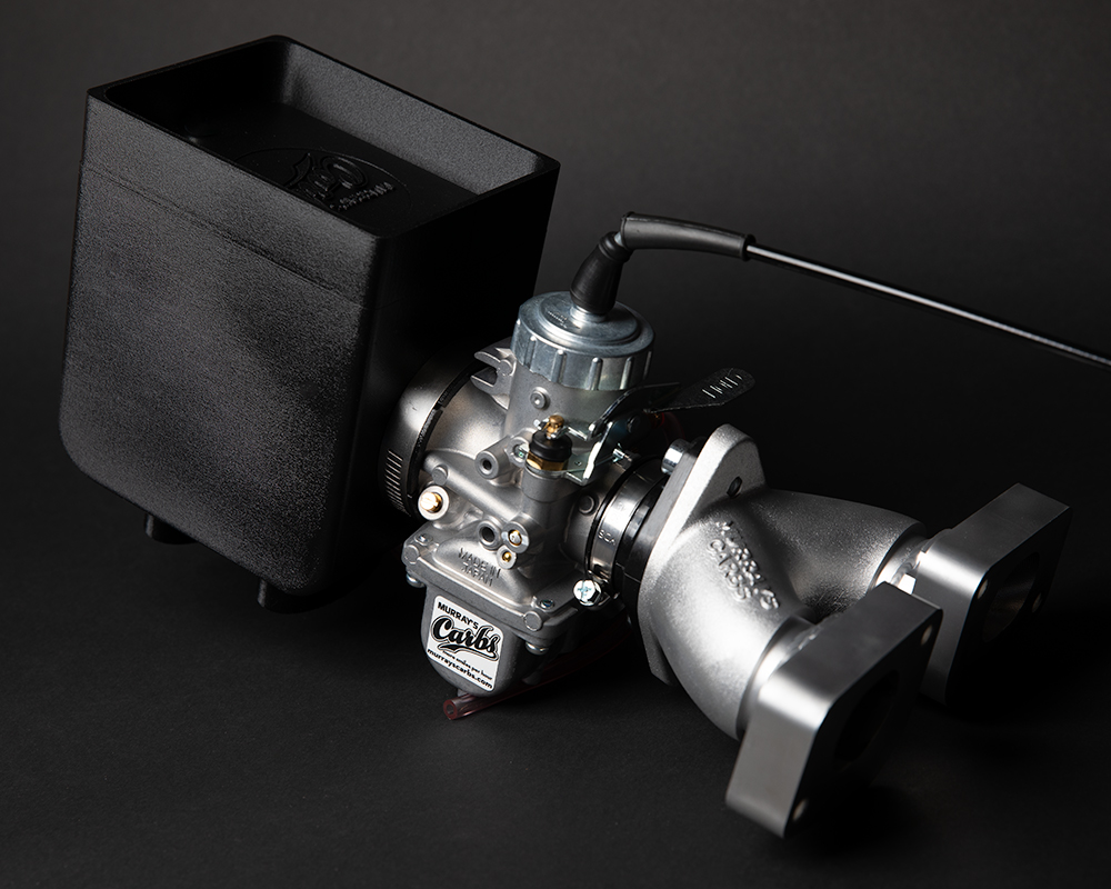 Murray's Yamaha TX500 Single Mikuni Carburetor Kit with optional custom air box and tool tray lid.